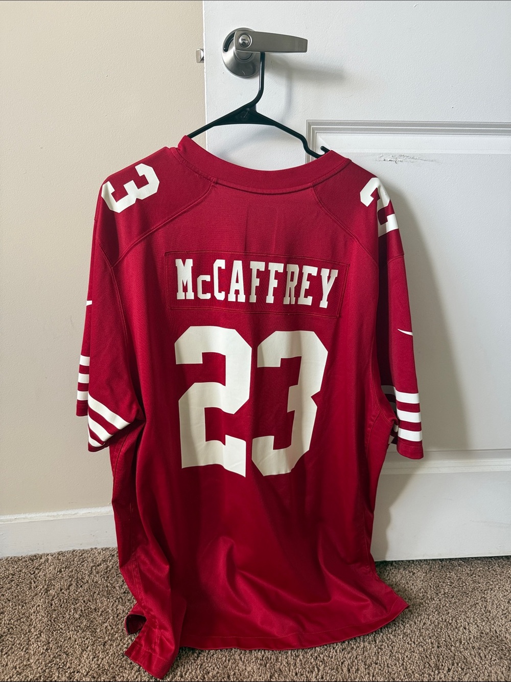 Nike Red Football Jersey with White Numbers #23